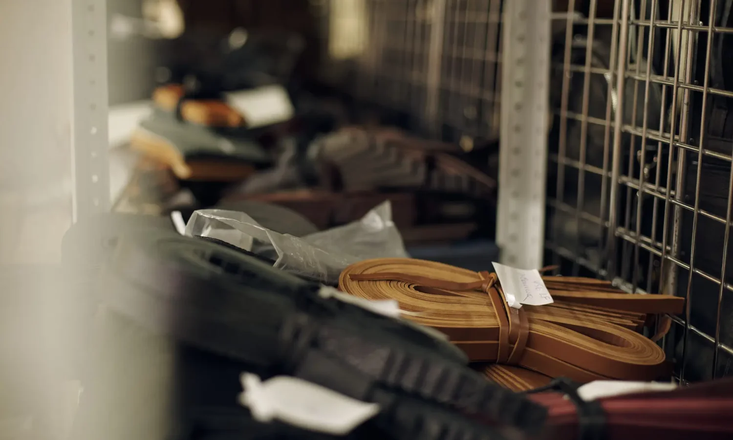 displaying leather straps in industrial setting